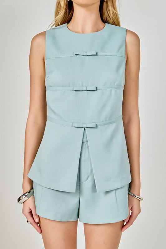 Jackie Front Slit Sleeveless Bow Trimmed Top