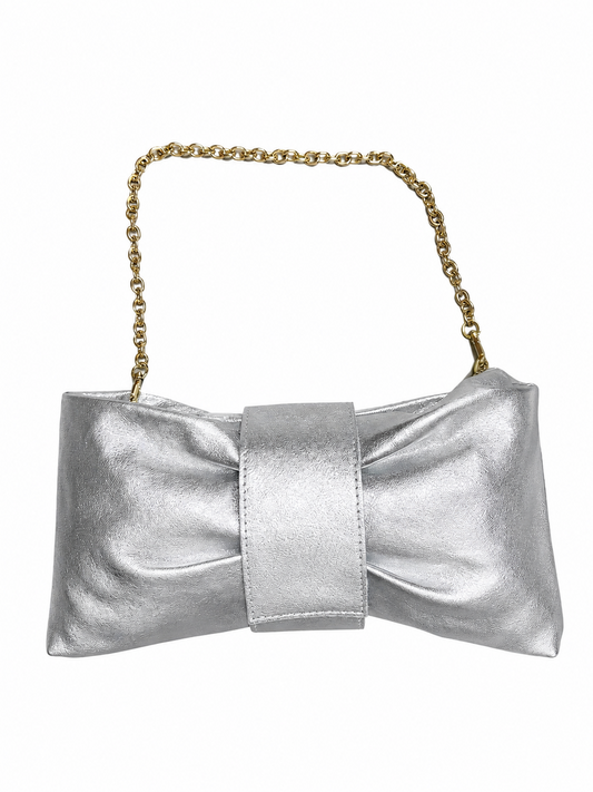 Silver clutch bag with a gold chain strap on a white background